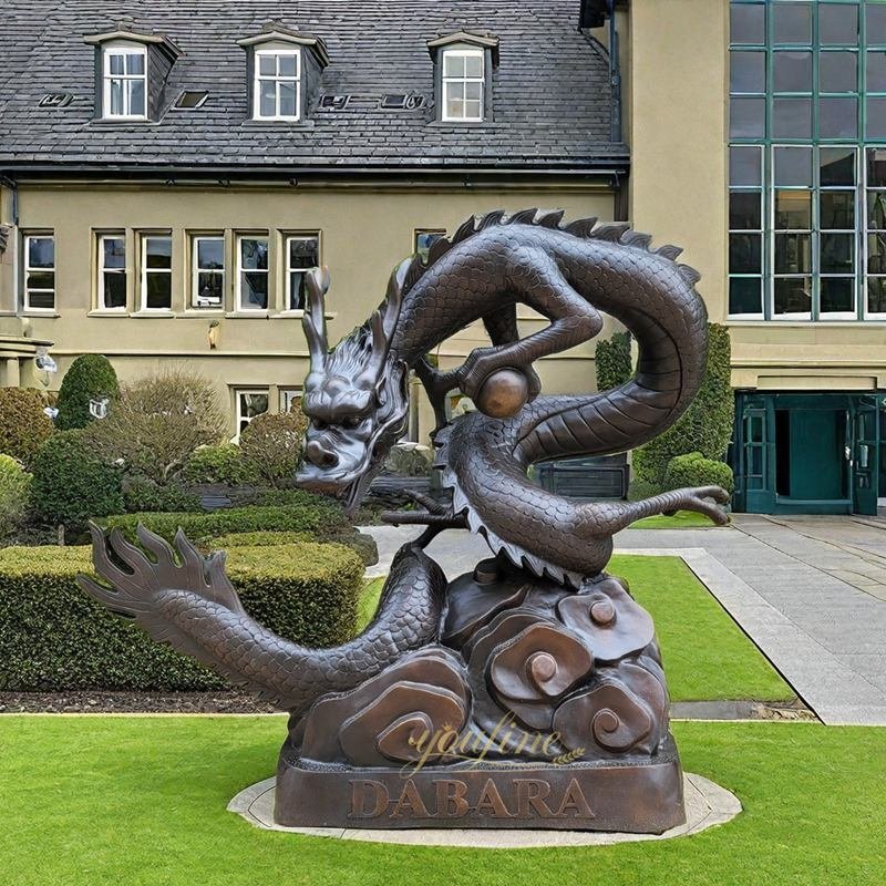 black bronze dragon with ball fountain