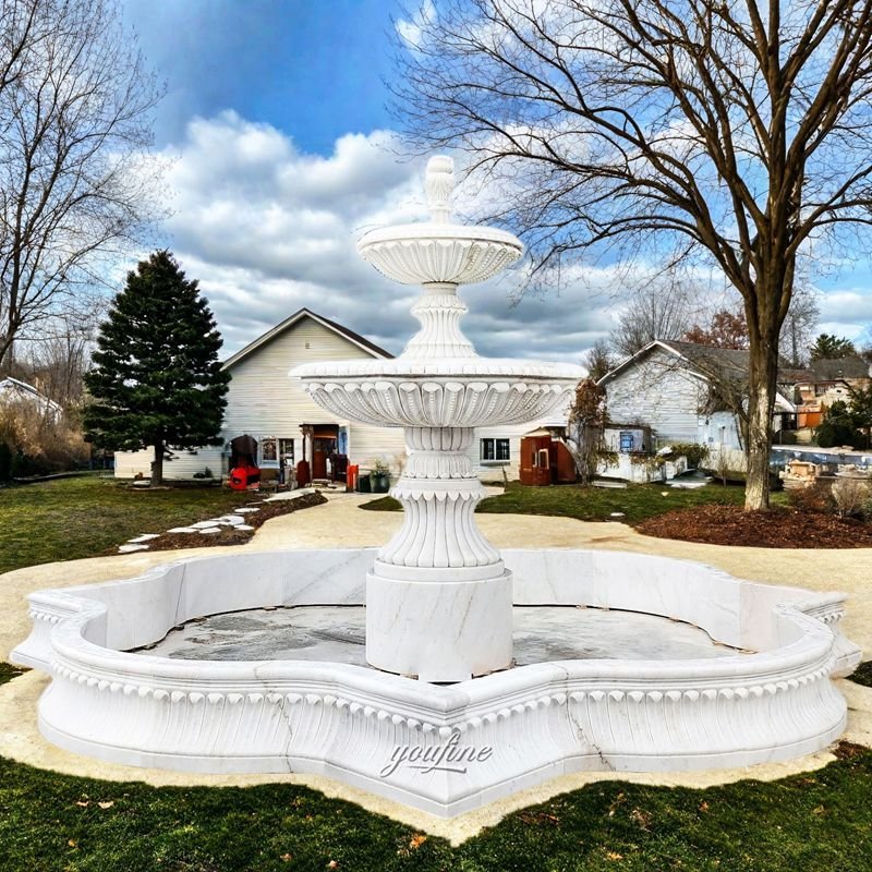 white irregularly tiered fountain