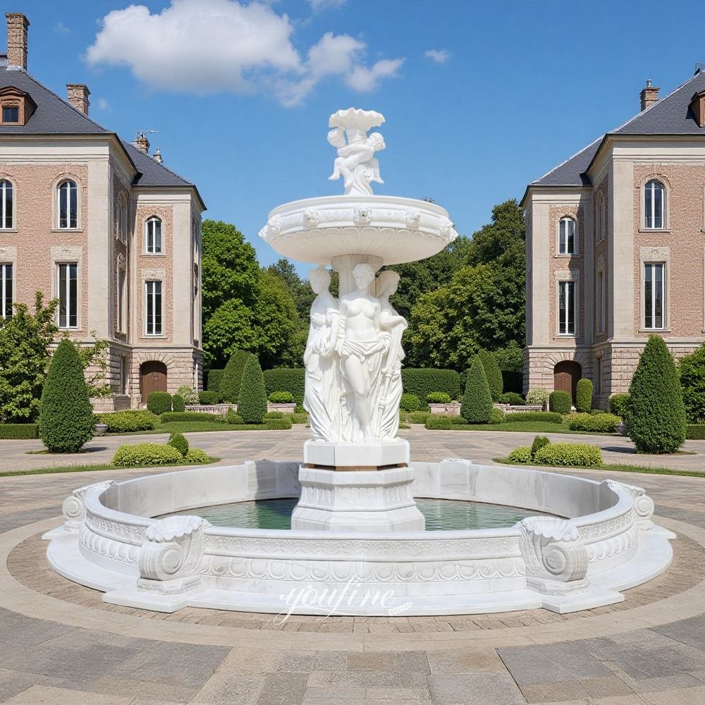 large outdoor white marble statue fountain