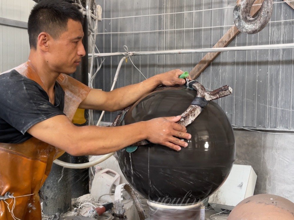 polishing of the marble sphere fountain