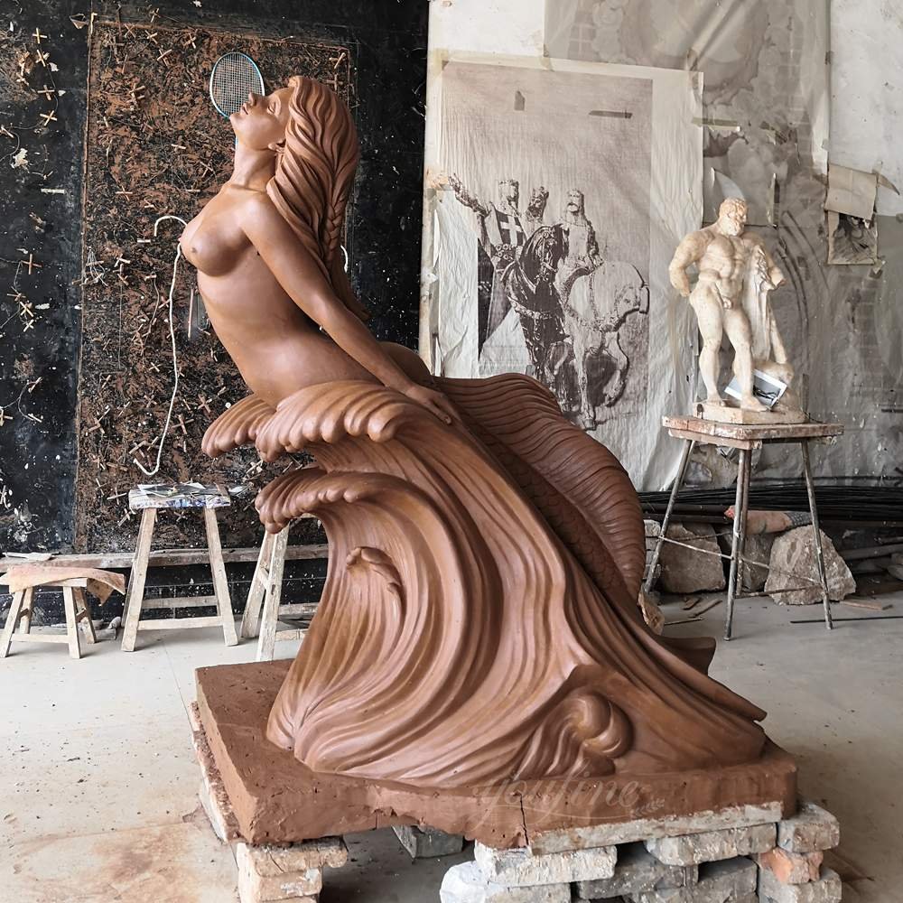 Clay model swimming in waves