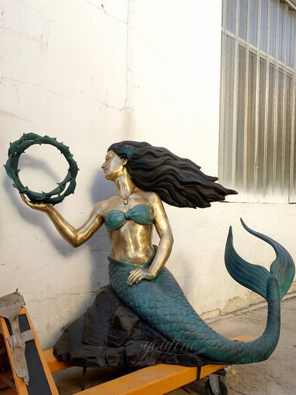 Finished holding fish garland