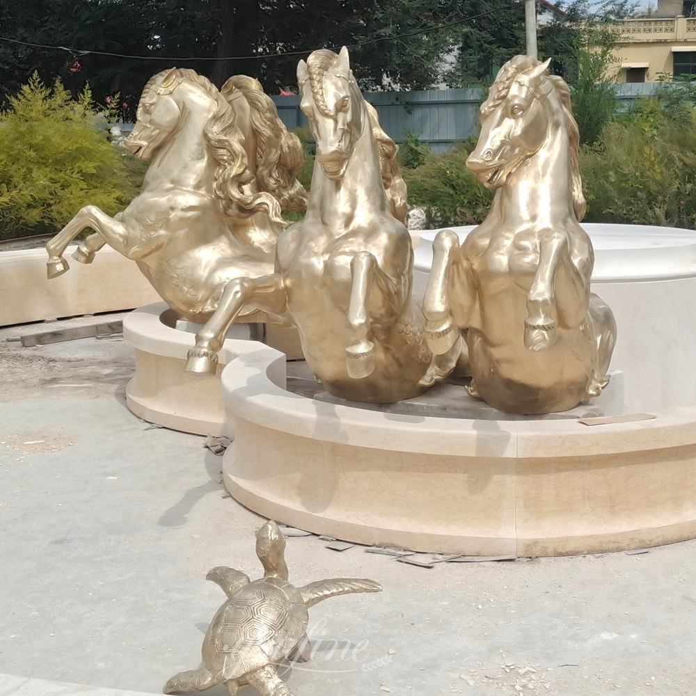 Polished bronze fountain