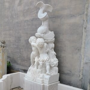 white marble big headed fish wall fountain detail