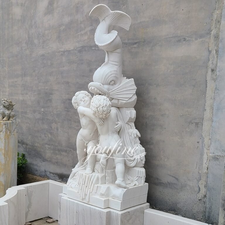 white marble big headed fish wall fountain detail