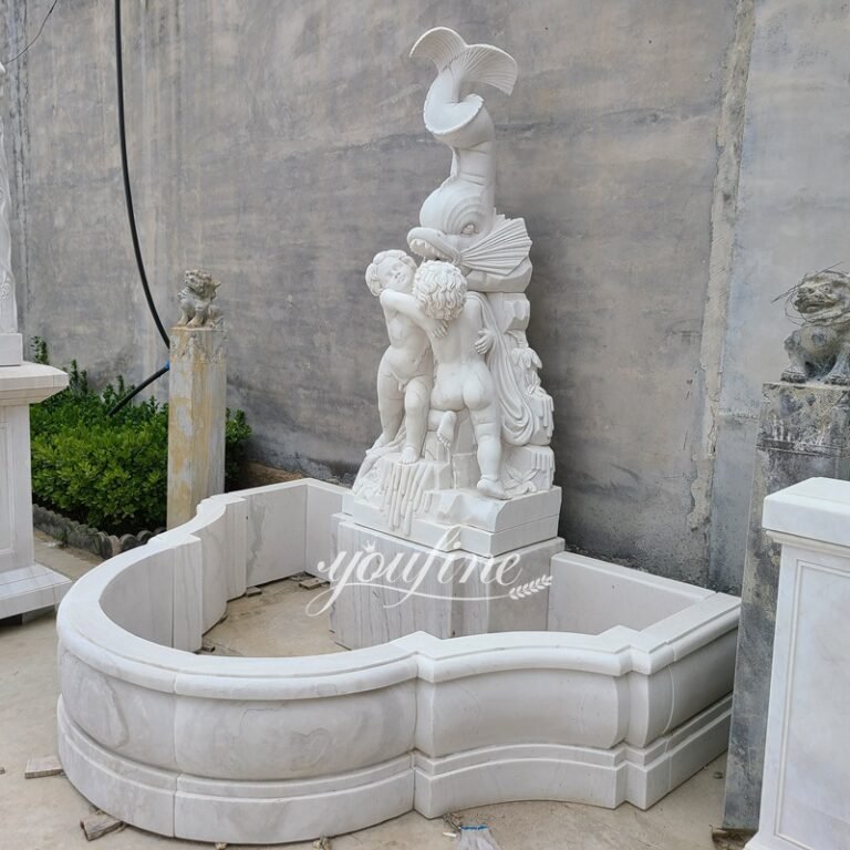 white marble fish wall fountain side view