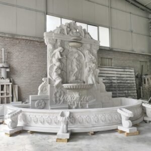 white marble large wall fountain with beautiful statues side view