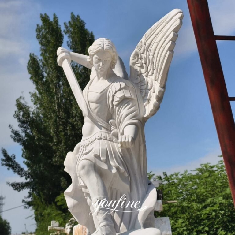 white catholic hand carved st michael angel statue fountain detail