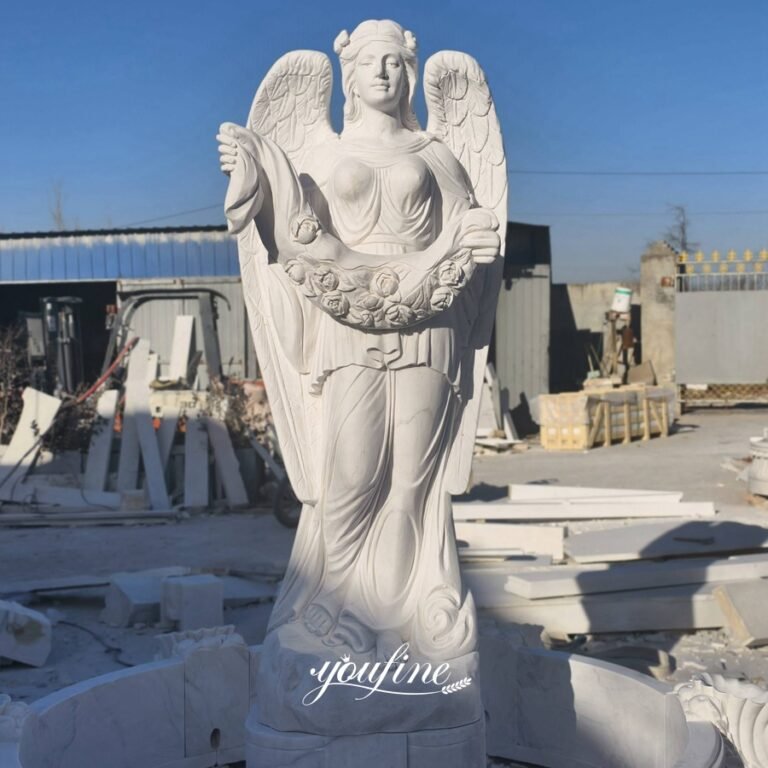 white marble holding flowers angel garden fountain statue detail