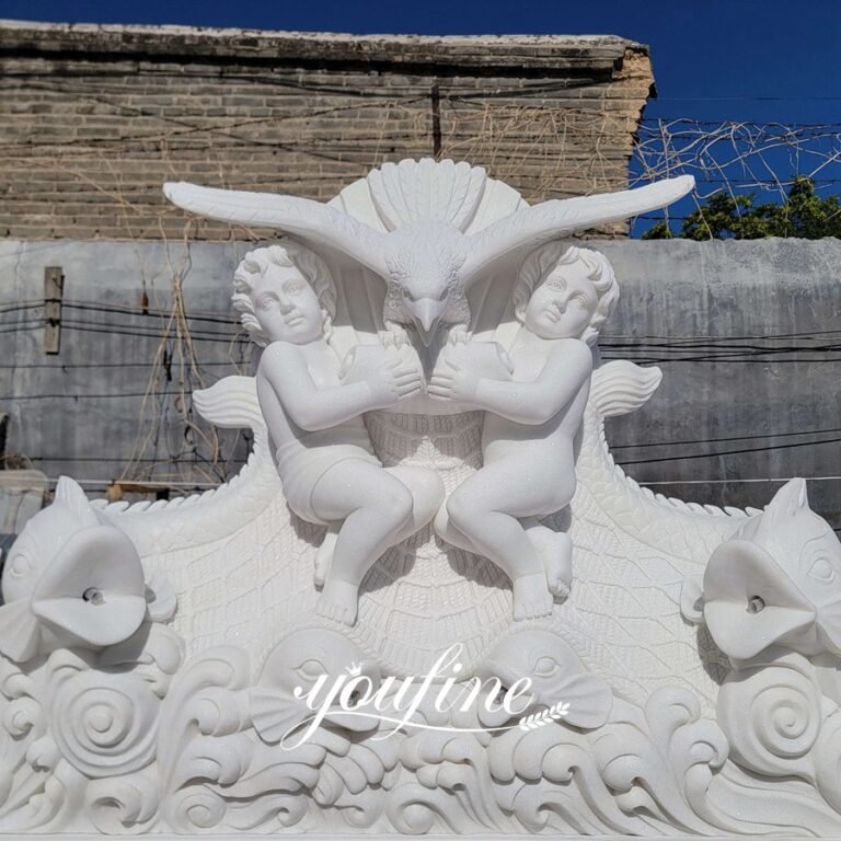 white finely carved marble eagle with cherub water fountain front detail