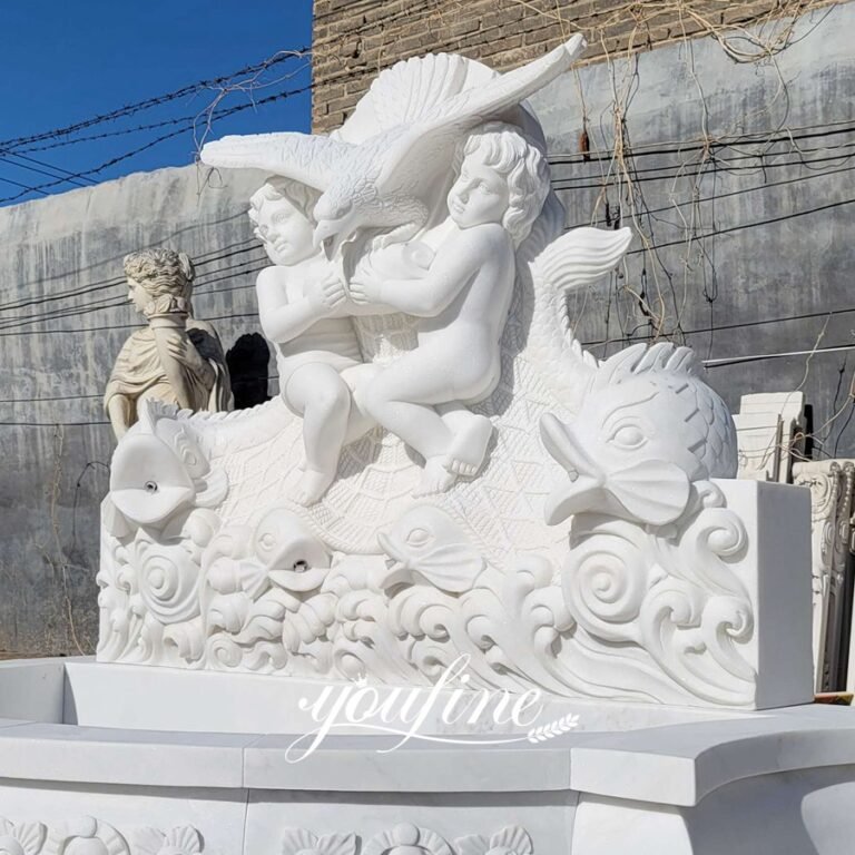 large white carved marble eagle with cherub water fountain side detail