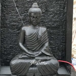 hand carved black marble buddha wall fountain detail