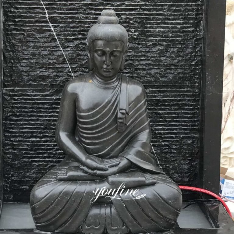hand carved black marble buddha wall fountain detail