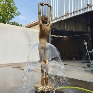 golden life size bronze ballerina water fountain back view