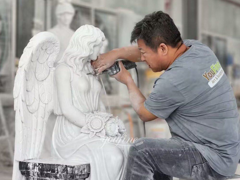 the carving process of a marble statue fountain