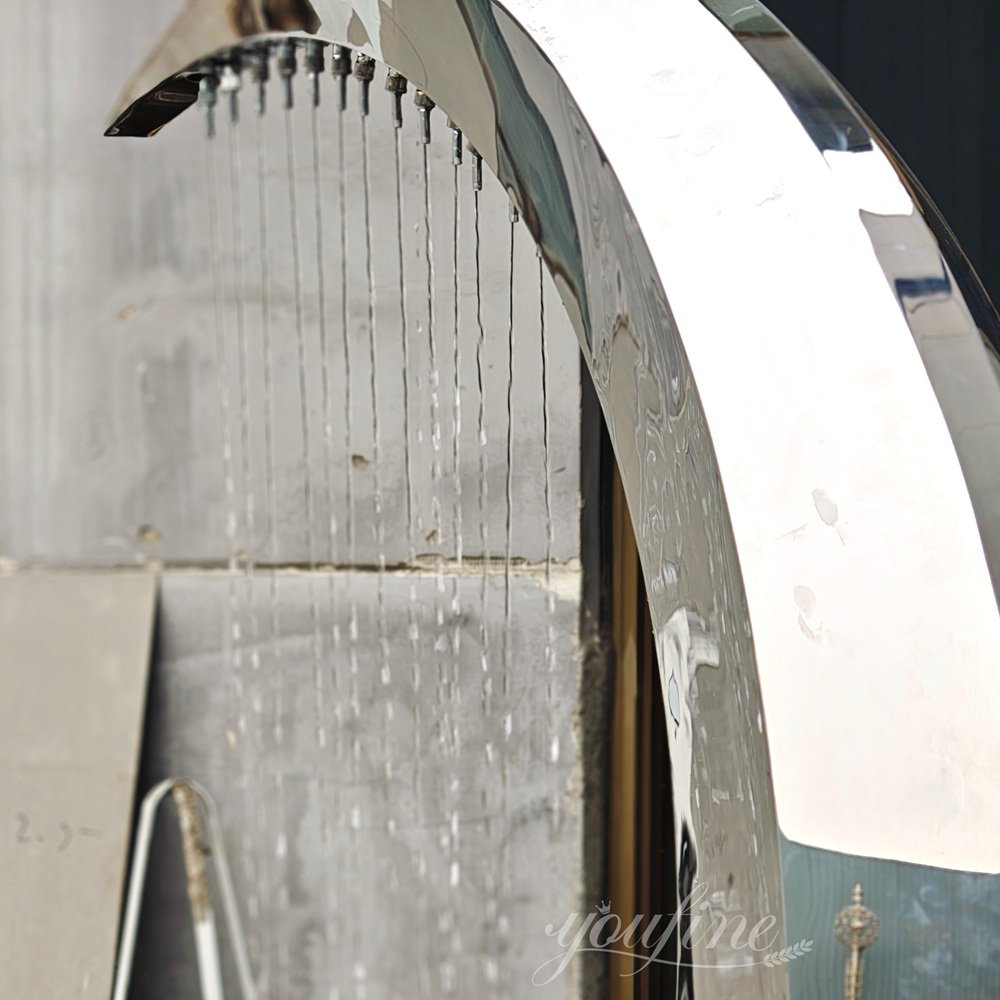Polished Metal Crescent Moon Sculpture Fountain Detail Polished Metal Crescent Moon Sculpture Fountain Detail