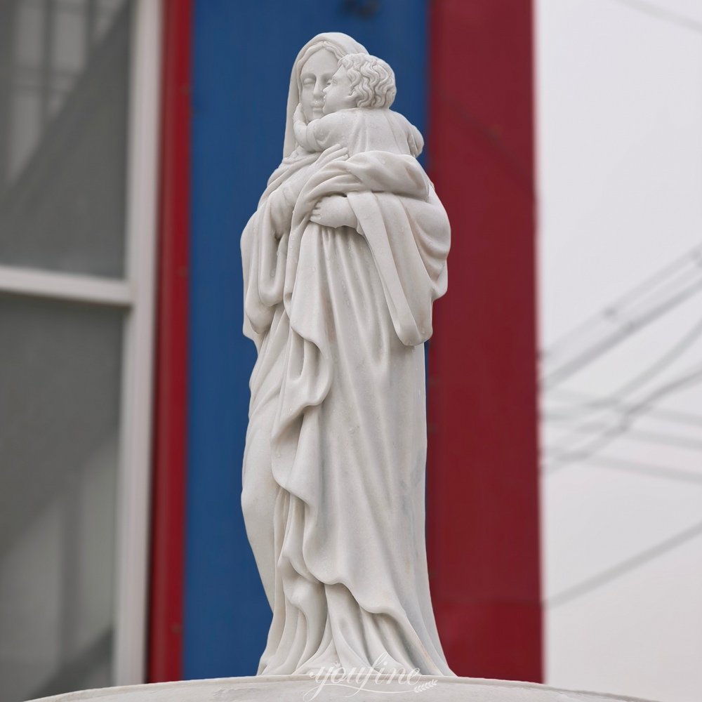 tiered marble virgin mary holding baby jesus statue fountain side detail tiered marble virgin mary holding baby jesus statue fountain side detail