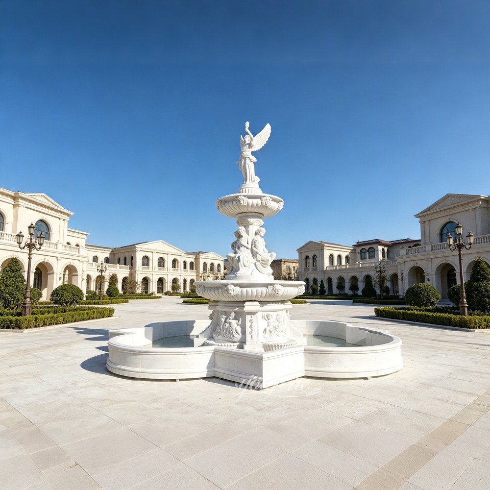 3 tiered fountain with an angel statue holding a torch for tourist town 3 tiered fountain with an angel statue holding a torch for tourist town
