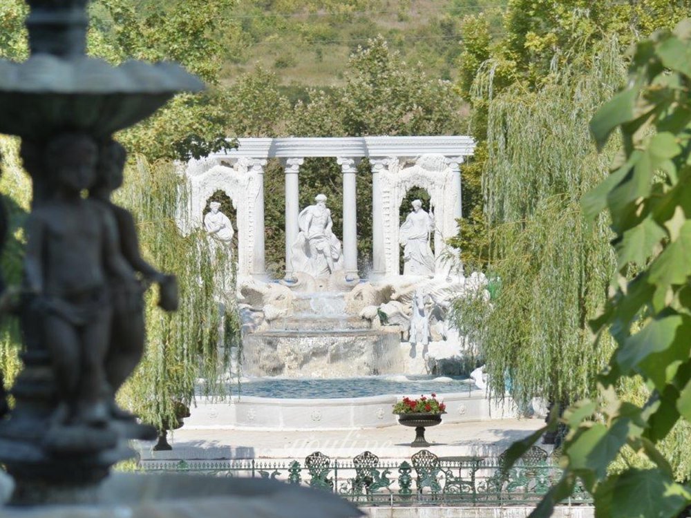 marble Trevi fountain replica at Apollo Manor courtyard