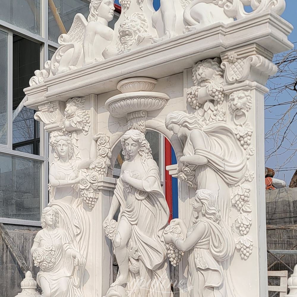 european marble goddess wall fountain with grape relief carvings side detail european marble goddess wall fountain with grape relief carvings side detail