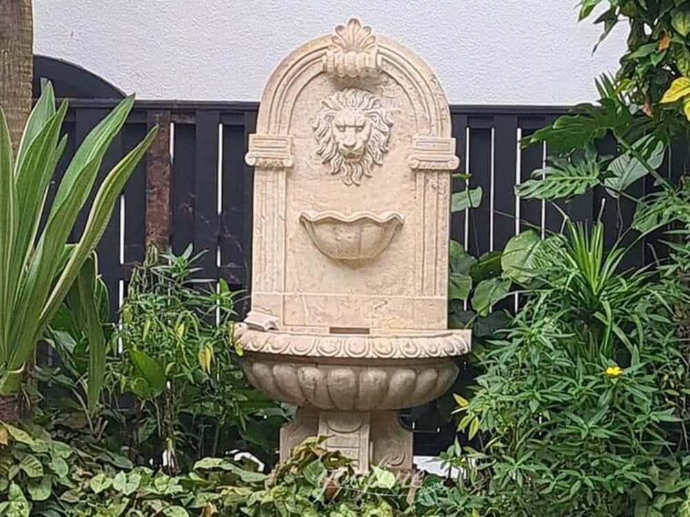 marble wall fountain in Singaporean courtyard