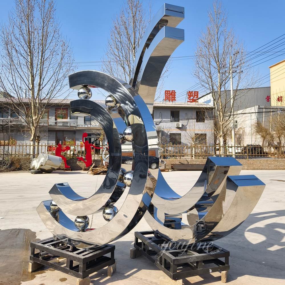 abstract metal bearing shaped mirror sculpture fountain side view abstract metal bearing shaped mirror sculpture fountain side view