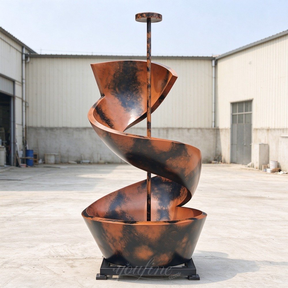 painted brown black spiral metal fountain front view painted brown black spiral metal fountain front view